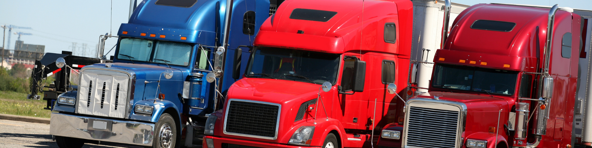 row of semi-trucks 